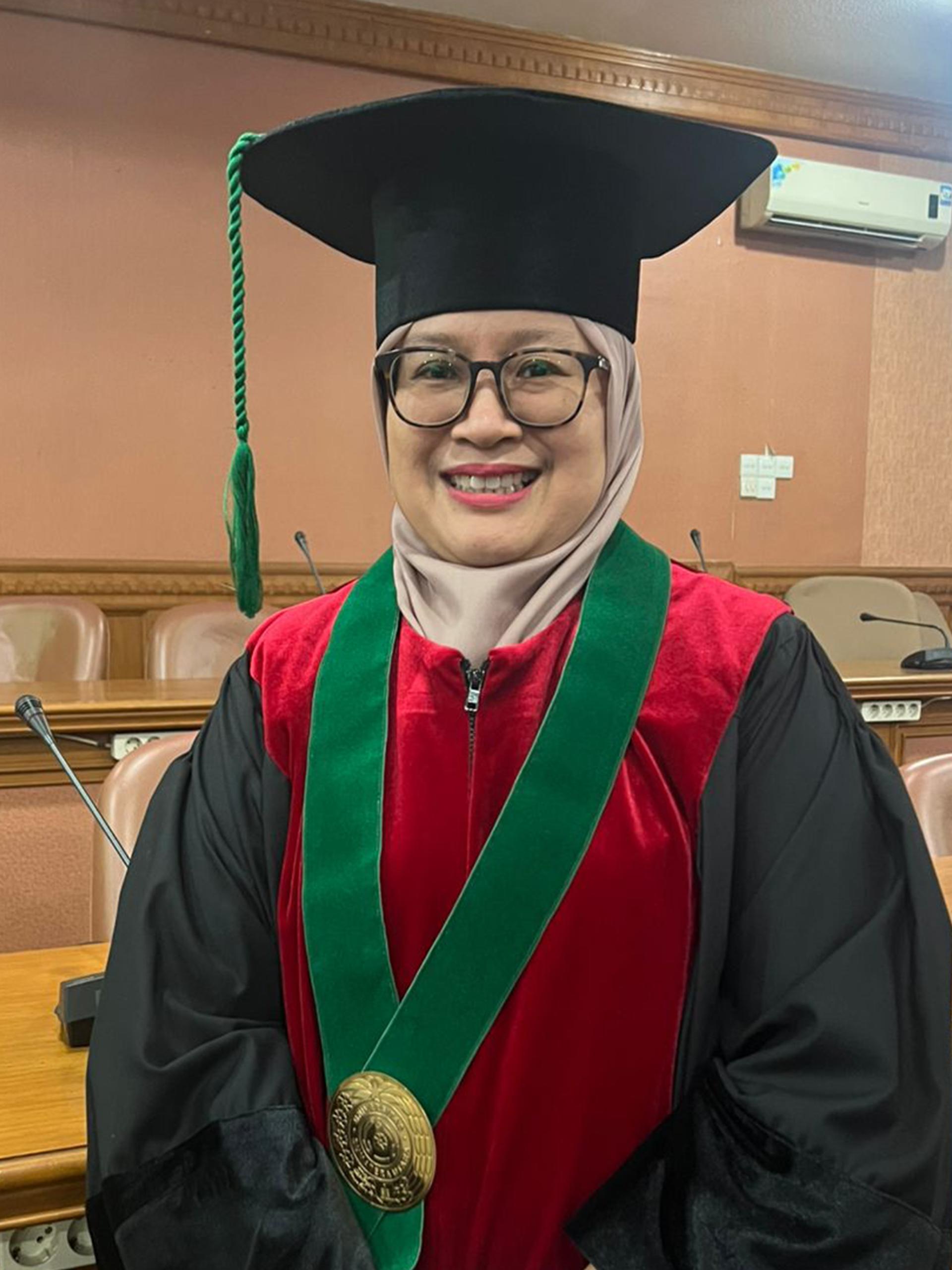 Prof. Dr. dr. Rina Amelia, MARS, FISPH. FISCM., Sp.KKLP., Subsp.FOMC